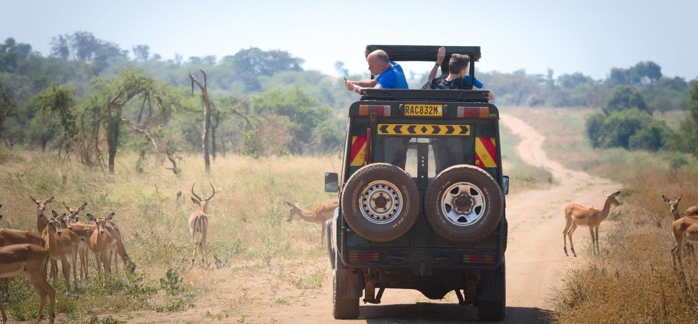 How can I book a family-friendly Rwanda safari tour?